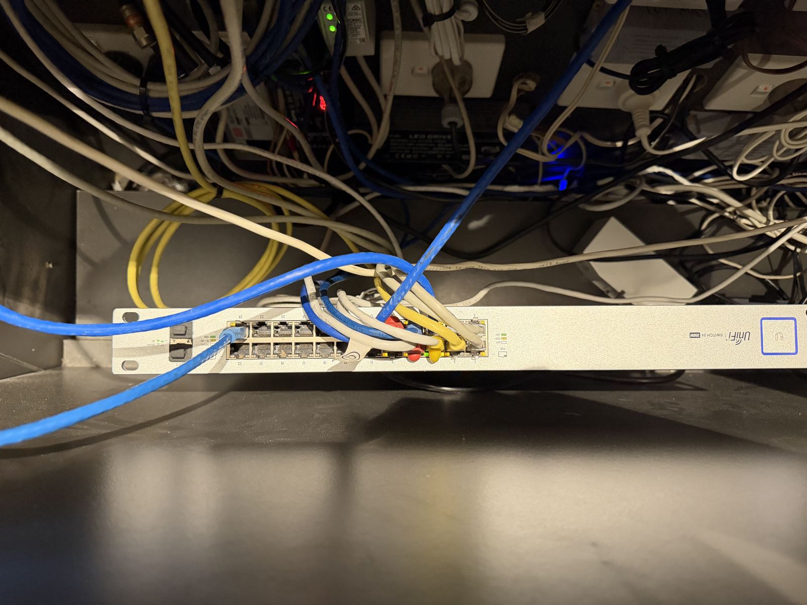 Network switch and cables in the comms cabinet