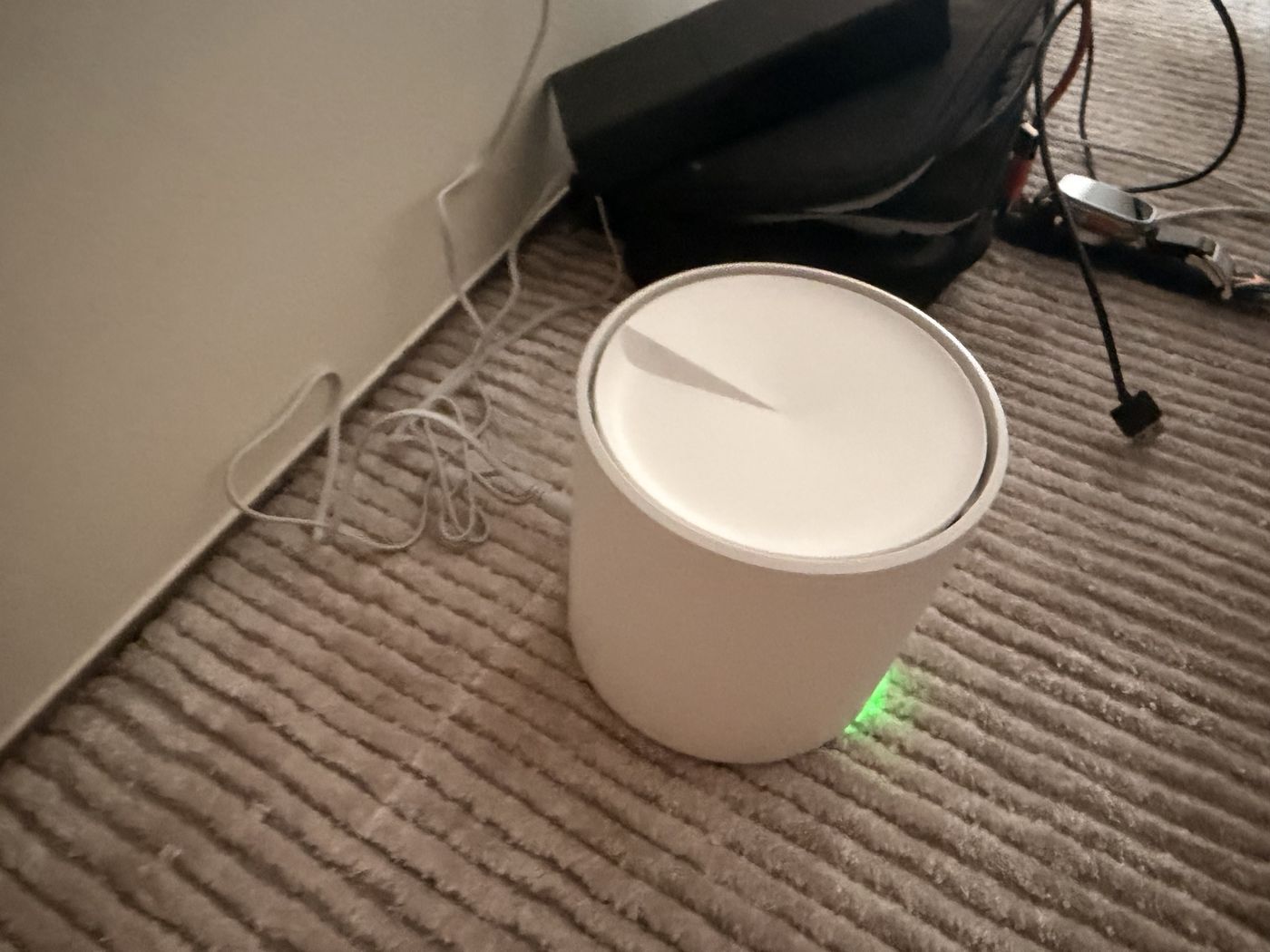 A mesh node in place with a green status light
